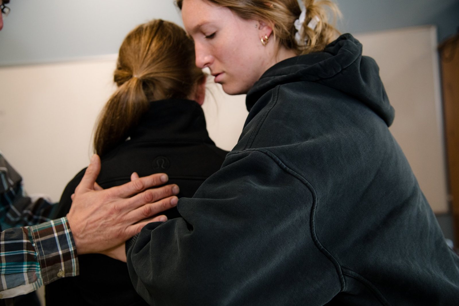 Hands-on osteopathic work during a supervised teaching session.